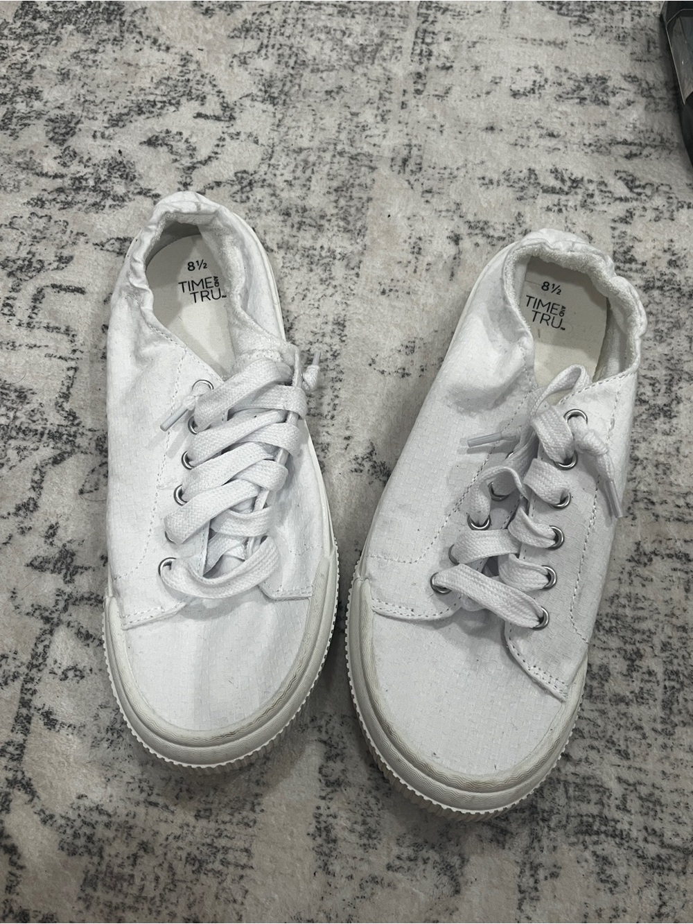 White slip on laced sneakers